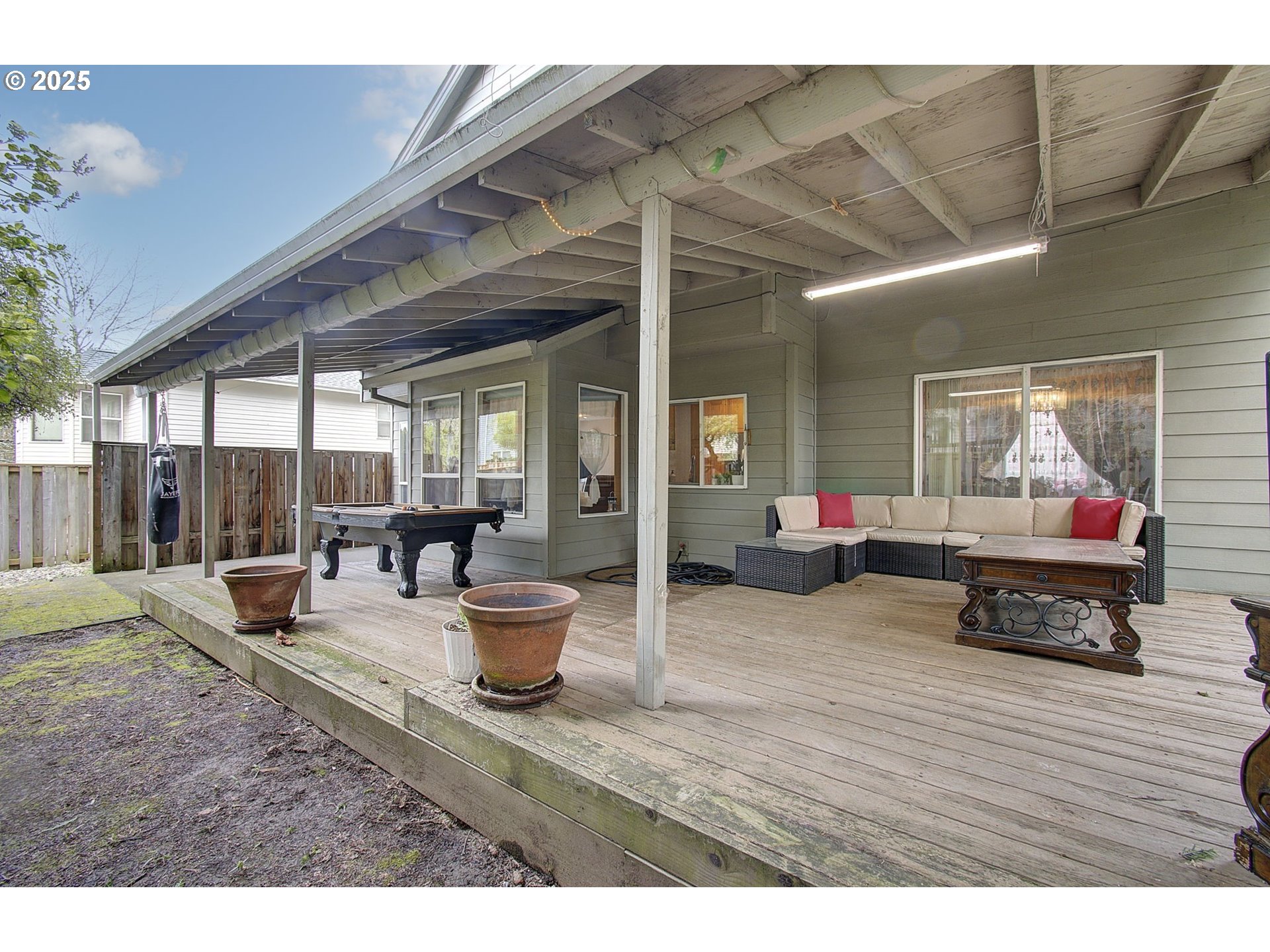 1758 Northwest 18th Court Gresham, OR 97030 - Photo 33 of 43 a living room with furniture and a wooden floor