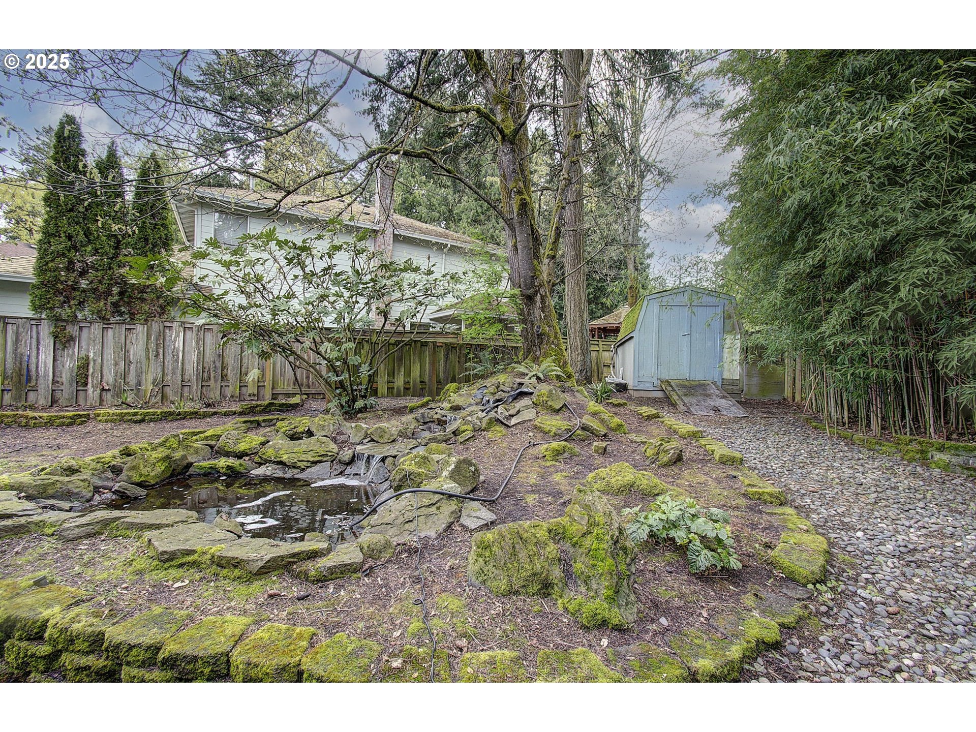 1758 Northwest 18th Court Gresham, OR 97030 - Photo 38 of 43 a backyard of a house with lots of green space