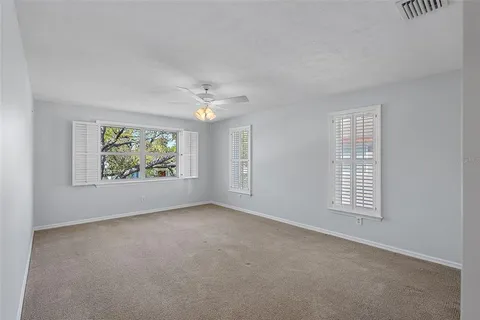 a view of a livingroom with closet and cabinet