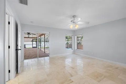 an aerial view of a house with a yard and garden