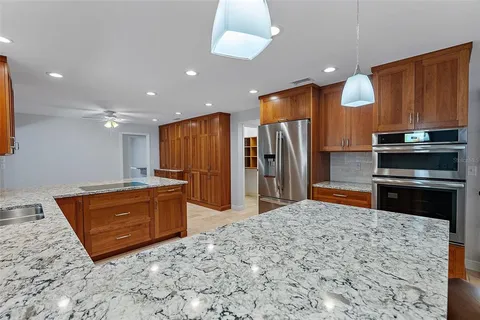an aerial view of residential building and ocean