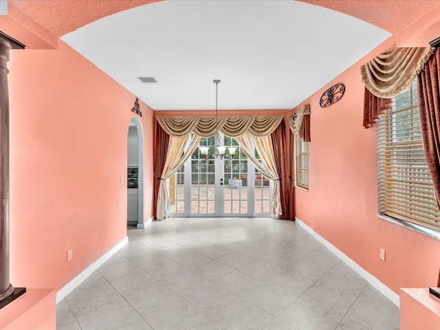 a view of a kitchen with furniture and a kitchen