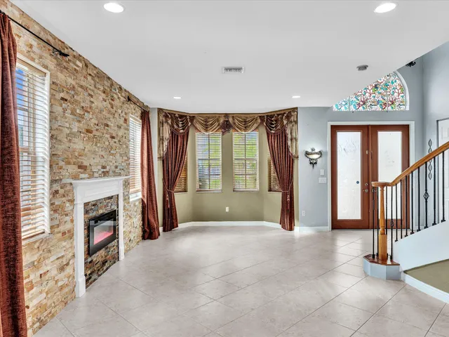 a view of staircase with railing and wooden floor