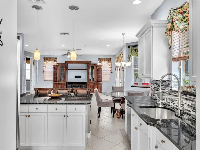 a bathroom with a sink vanity and a mirror