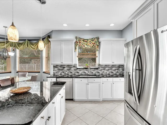 a view of room with a flat screen tv