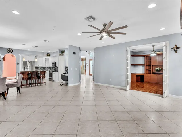 a view of a park with large trees