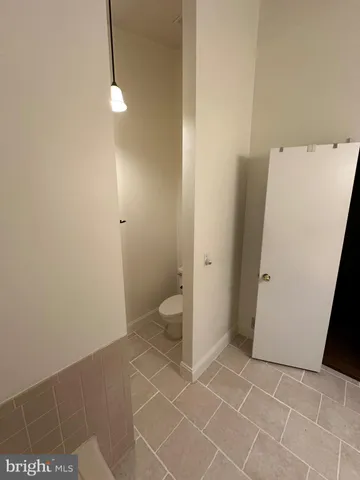 a bathroom with a sink and toilet