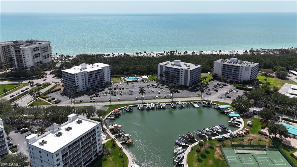 1 Bluebill Avenue, Unit 401 Naples, FL 34108 - Photo 7 of 35 an aerial view of a house with a ocean view