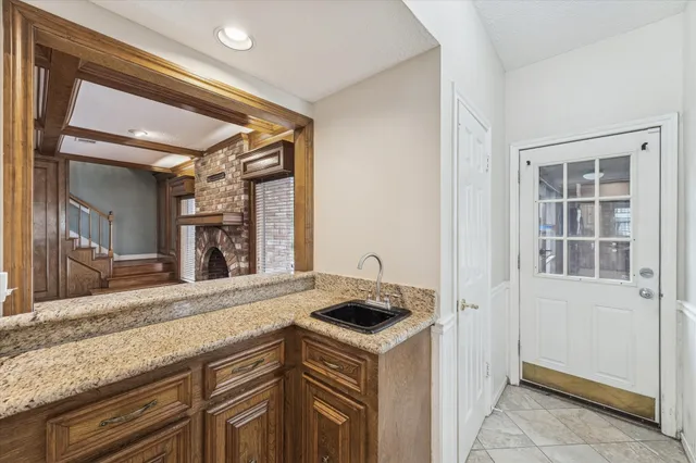 a bathroom with a sink a vanity and a mirror