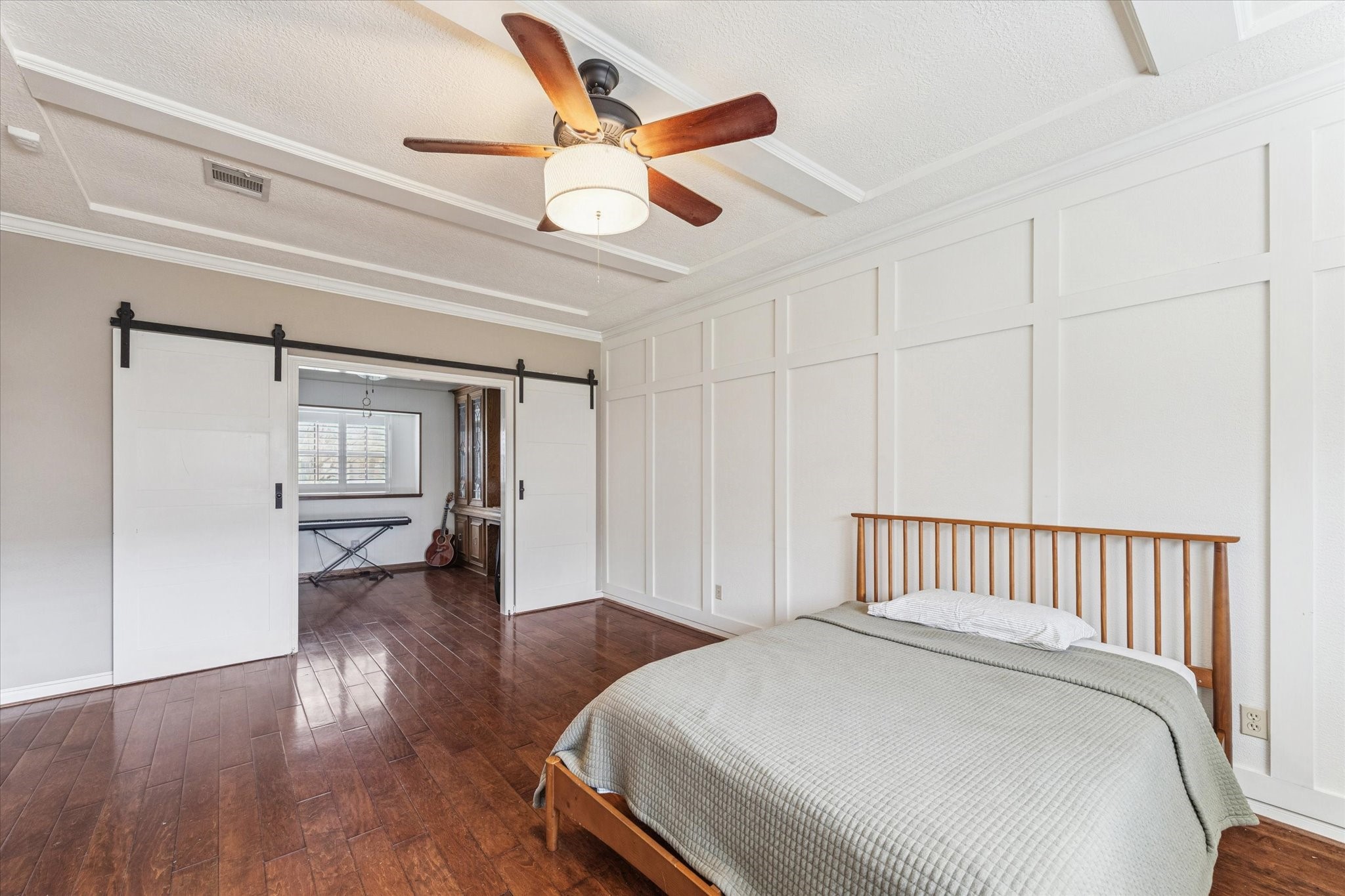 18327 Forest Elms Drive Spring, TX 77388 - Photo 16 of 30 a spacious bedroom with a bed and a ceiling fan