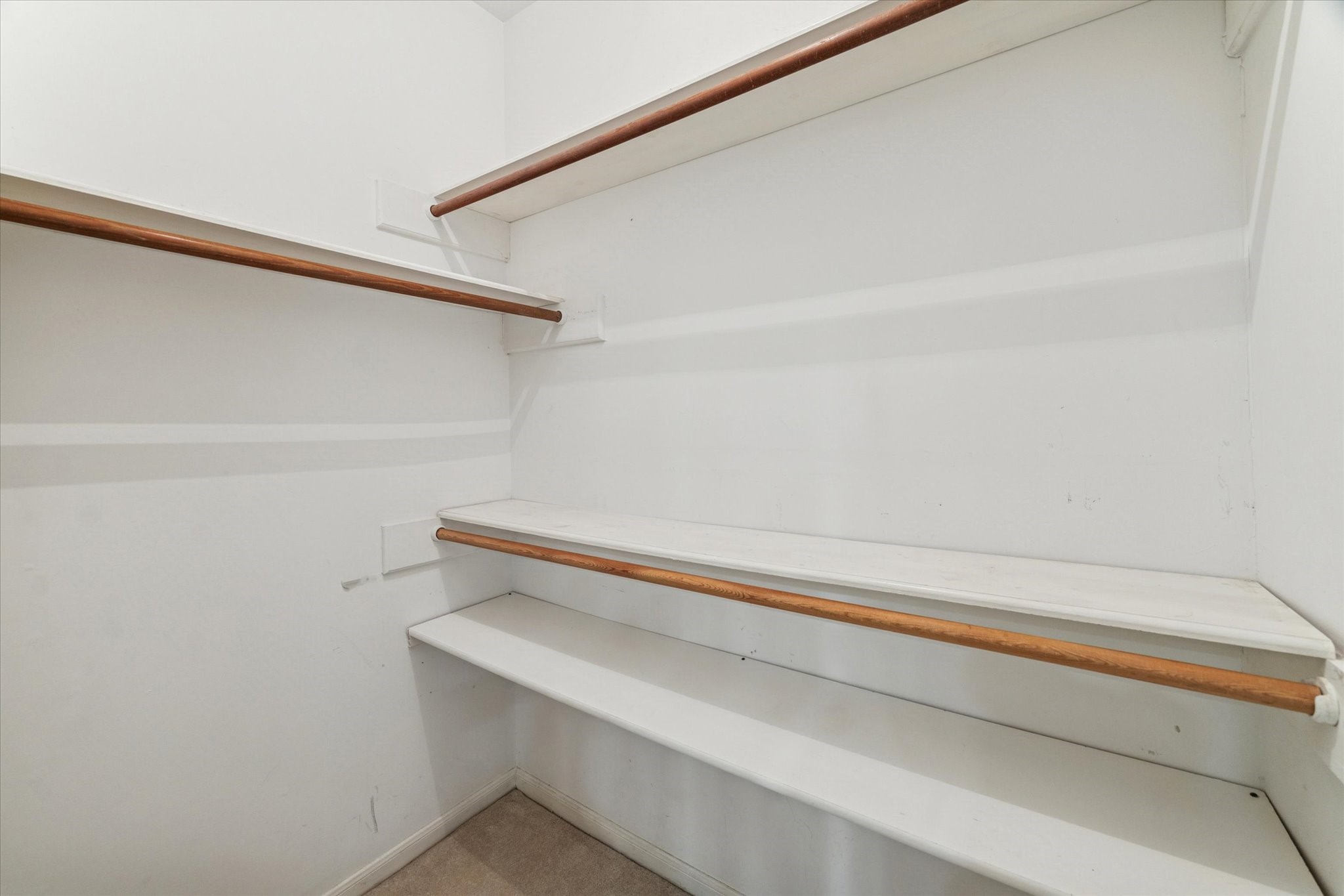 18327 Forest Elms Drive Spring, TX 77388 - Photo 19 of 30 a view of small space with racks on the wall