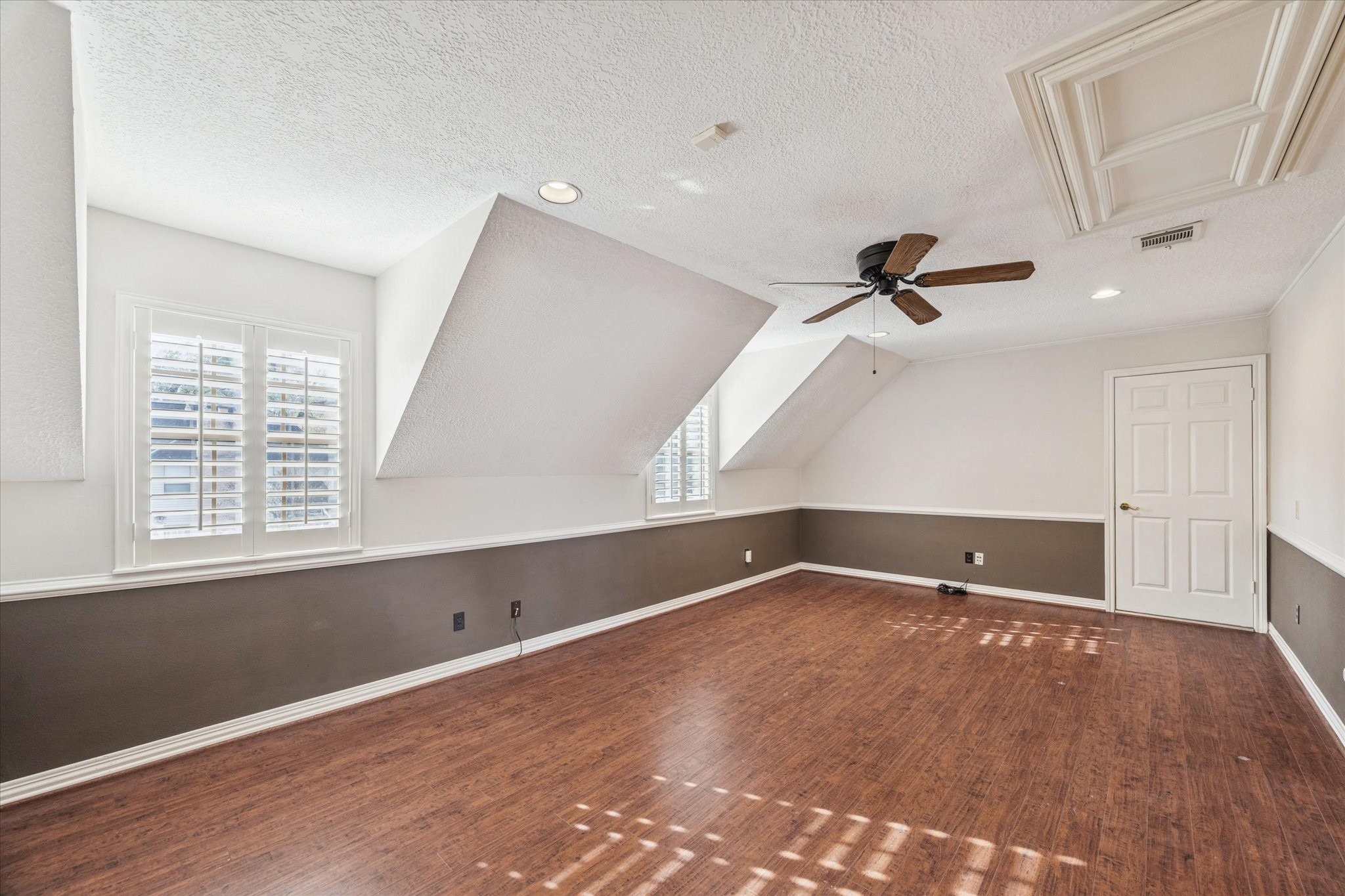 18327 Forest Elms Drive Spring, TX 77388 - Photo 20 of 30 a view of an empty room with a window and wooden floor