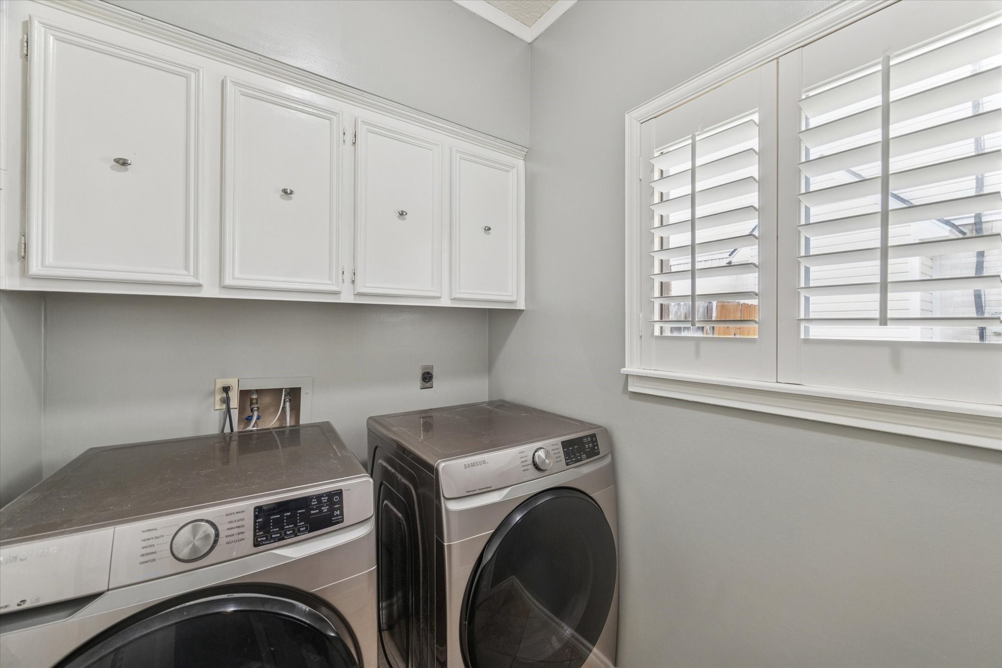 18327 Forest Elms Drive Spring, TX 77388 - Photo 26 of 30 a utility room with dryer and washer