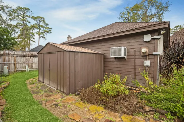a backyard of a house with lots of green space