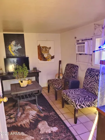 a kitchen with stainless steel appliances a sink stove and window