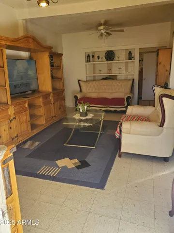 a living room with a couch and a flat screen tv