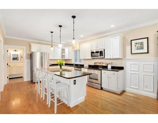 21 Valley View Circle Rutland, MA 01543 - Photo 6 of 40 a kitchen with stainless steel appliances granite countertop a refrigerator a stove top oven a sink dishwasher and white cabinets with wooden floor