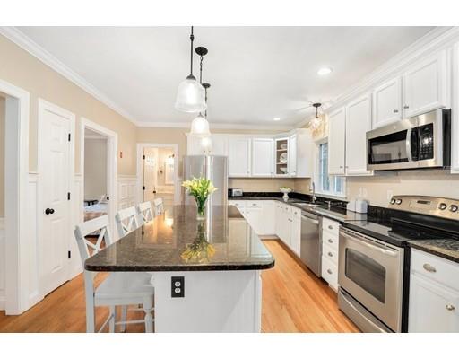 21 Valley View Circle Rutland, MA 01543 - Photo 7 of 40 a kitchen with stainless steel appliances granite countertop a sink a stove and cabinets