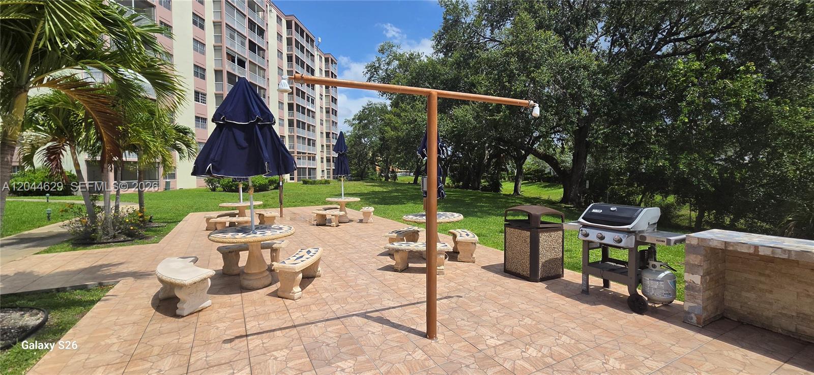 9101 West Sample Road, Unit 306 Coral Springs, FL 33065 - Photo 41 of 41 BBQ area