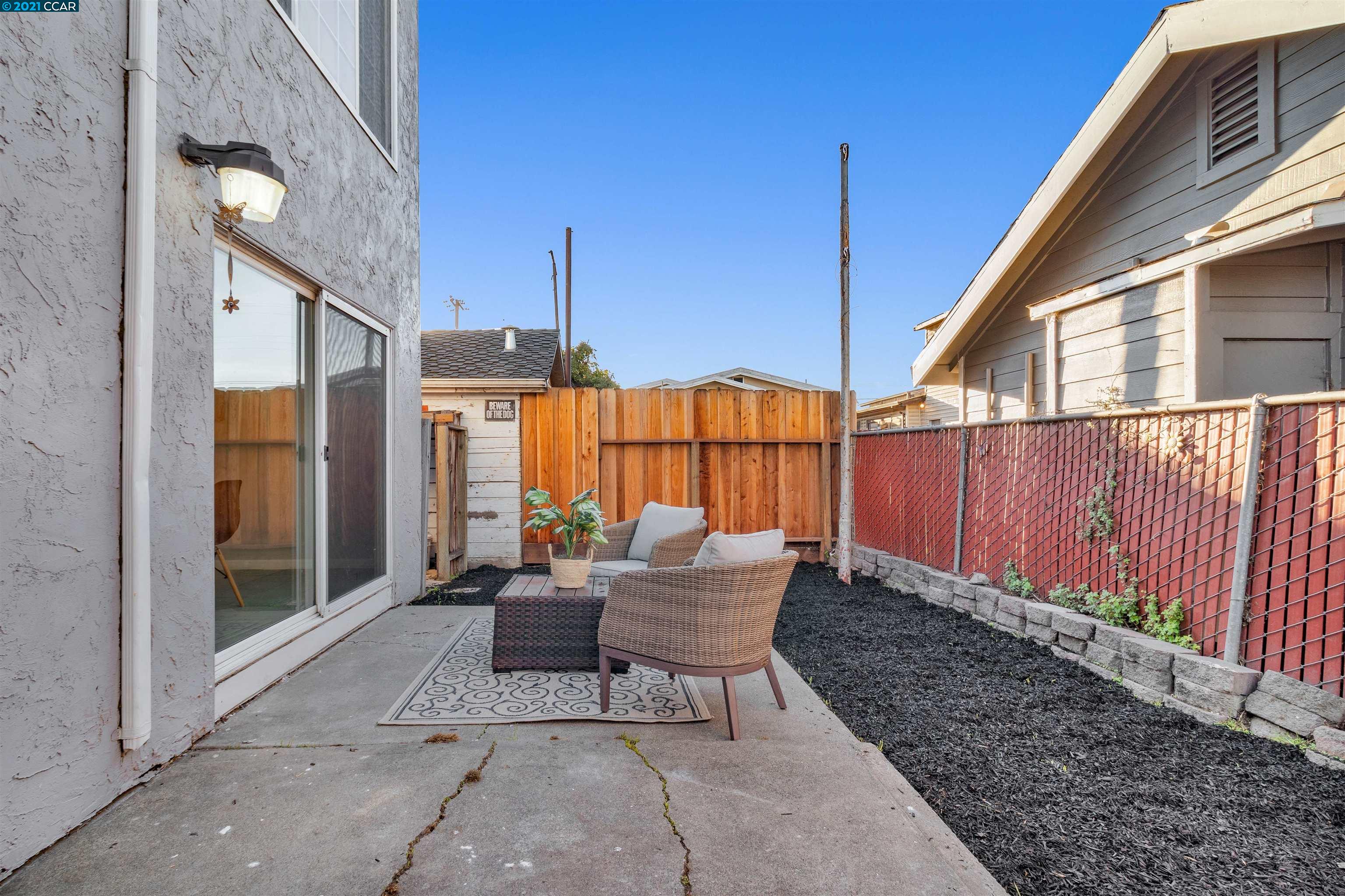 Herbert Guice Way Oakland, CA 94621 - Photo 18 of 40 a outdoor space with balcony