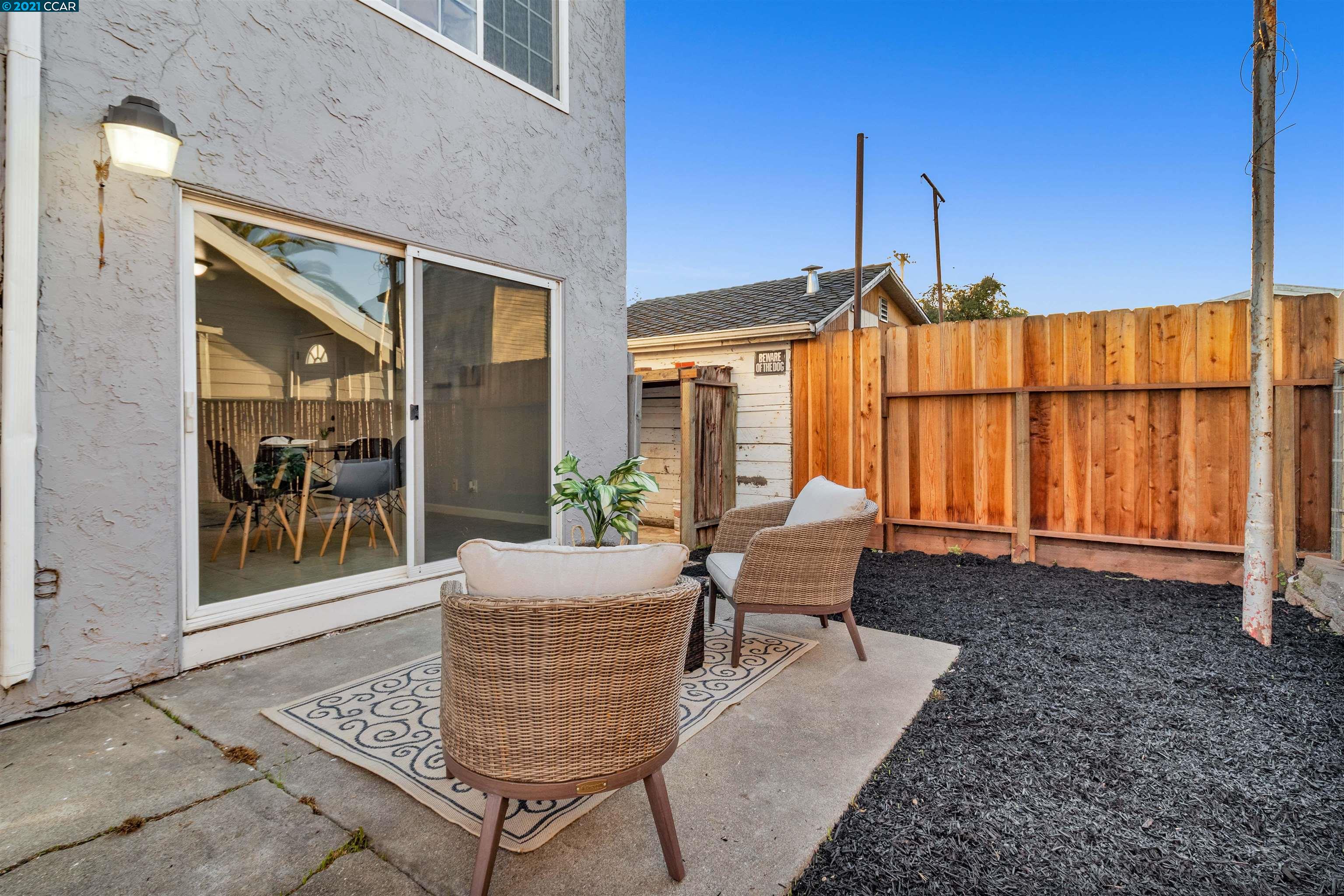 Herbert Guice Way Oakland, CA 94621 - Photo 19 of 40 a balcony with furniture