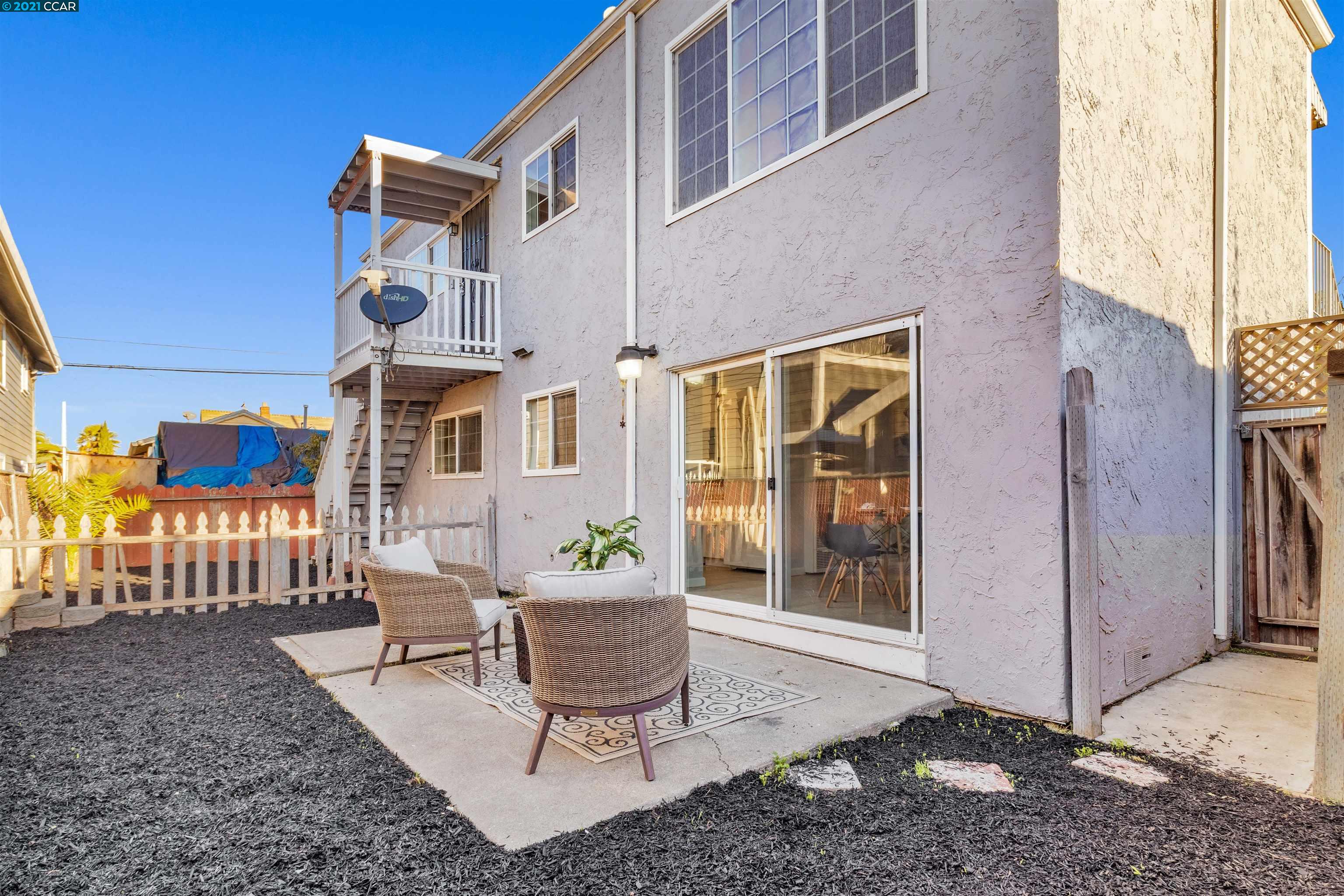 Herbert Guice Way Oakland, CA 94621 - Photo 20 of 40 a building outdoor space with patio furniture