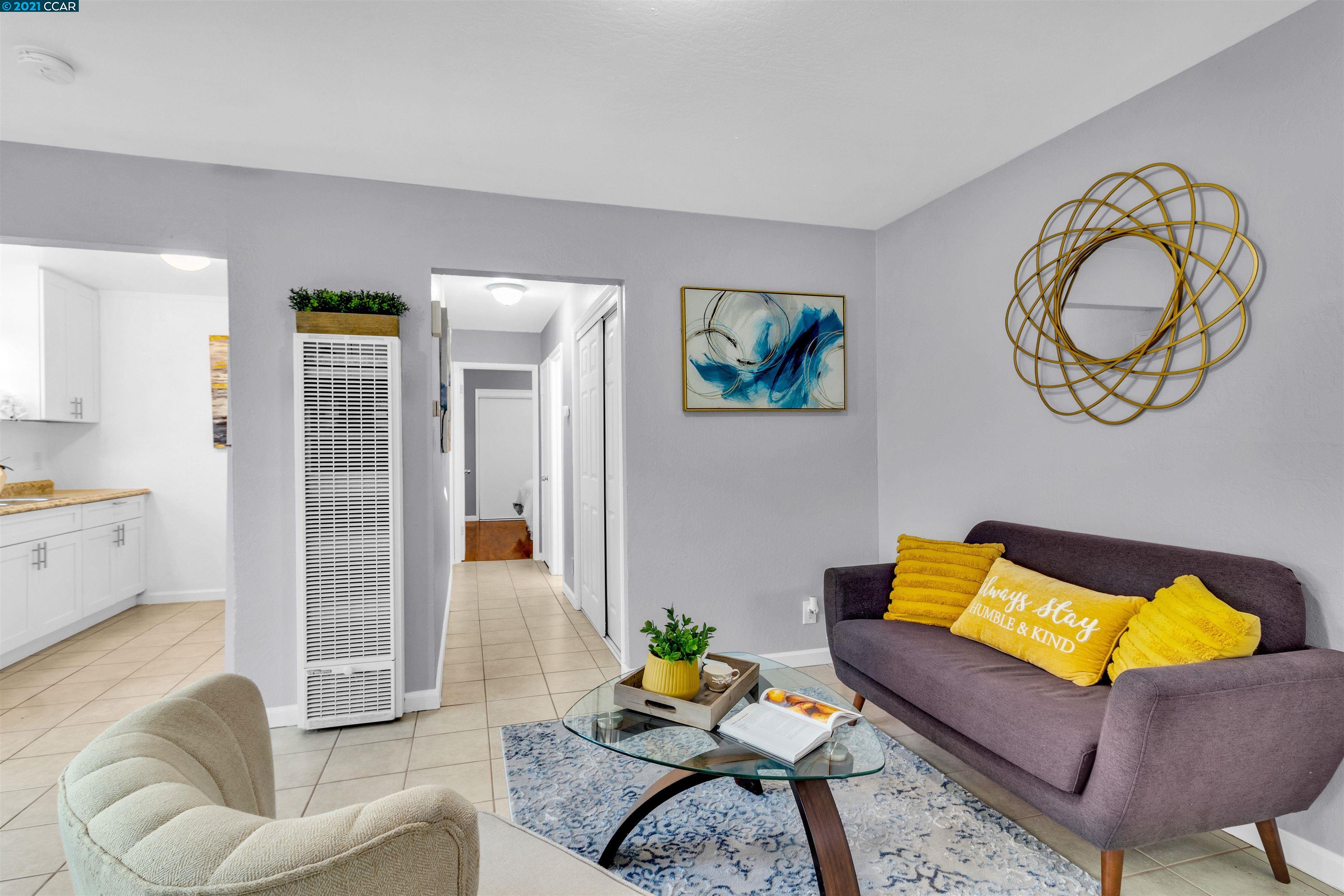 Herbert Guice Way Oakland, CA 94621 - Photo 2 of 40 a living room with furniture and wooden floor