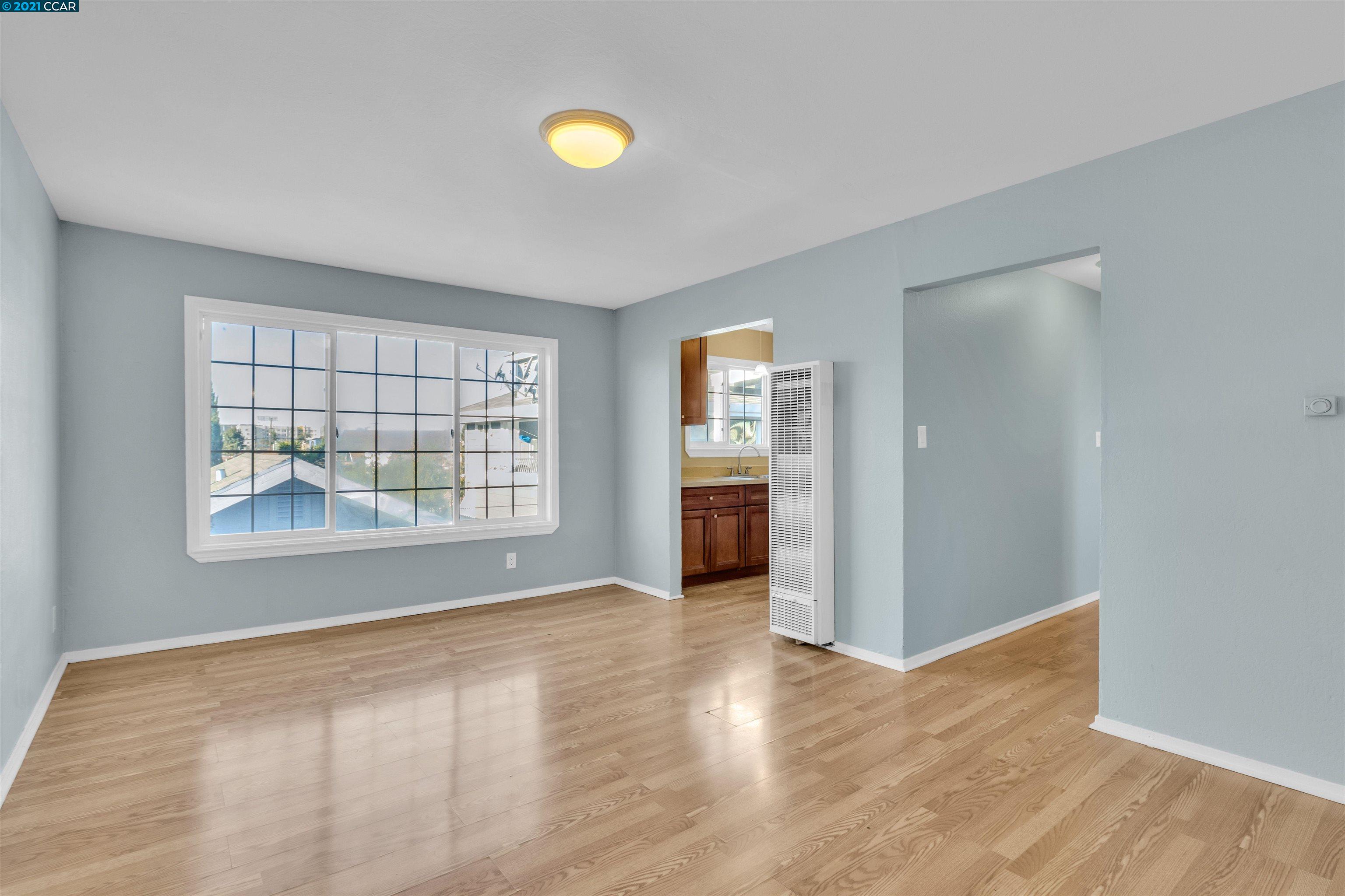 Herbert Guice Way Oakland, CA 94621 - Photo 24 of 40 an empty room with windows and closet