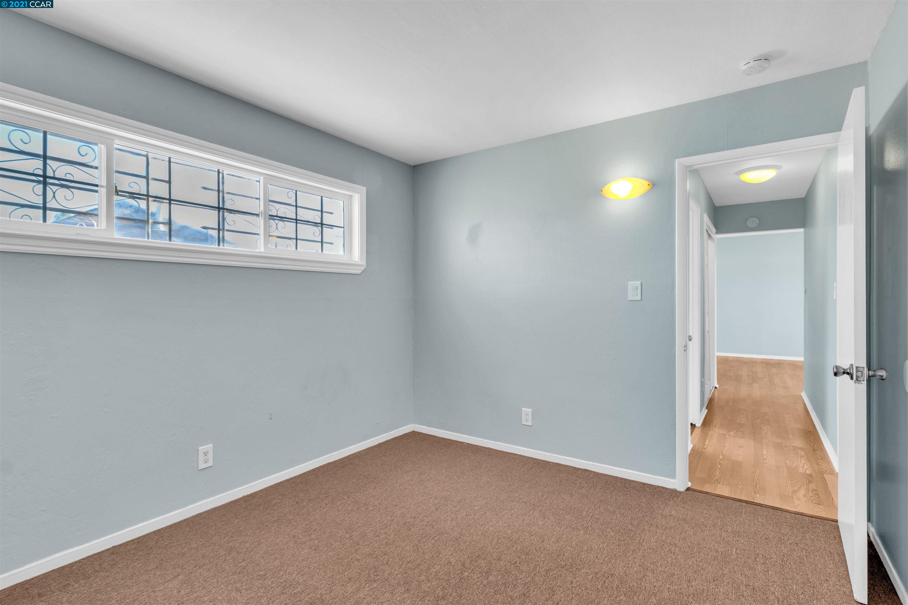 Herbert Guice Way Oakland, CA 94621 - Photo 28 of 40 an empty room with windows