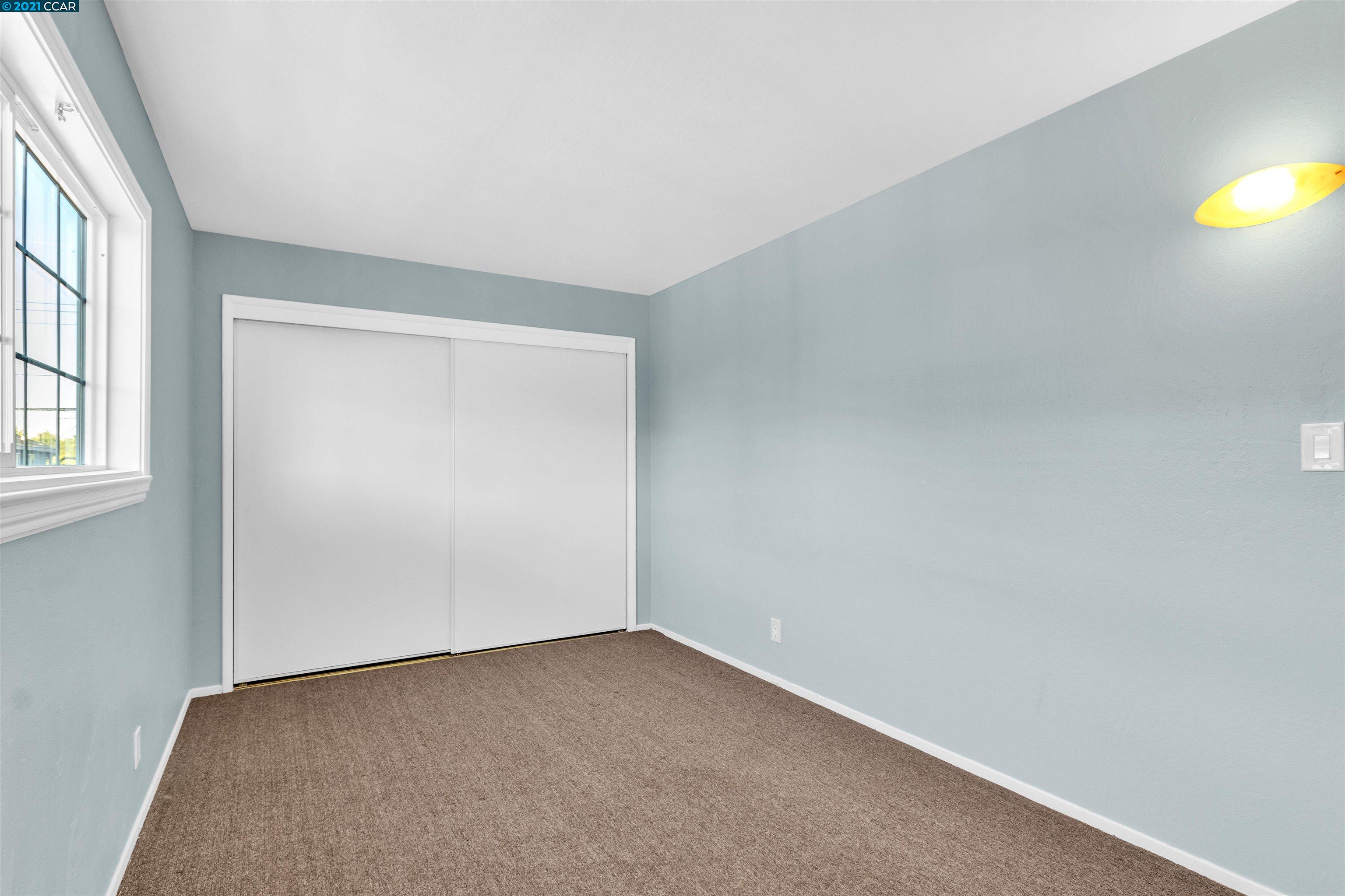 Herbert Guice Way Oakland, CA 94621 - Photo 29 of 40 an empty room with windows