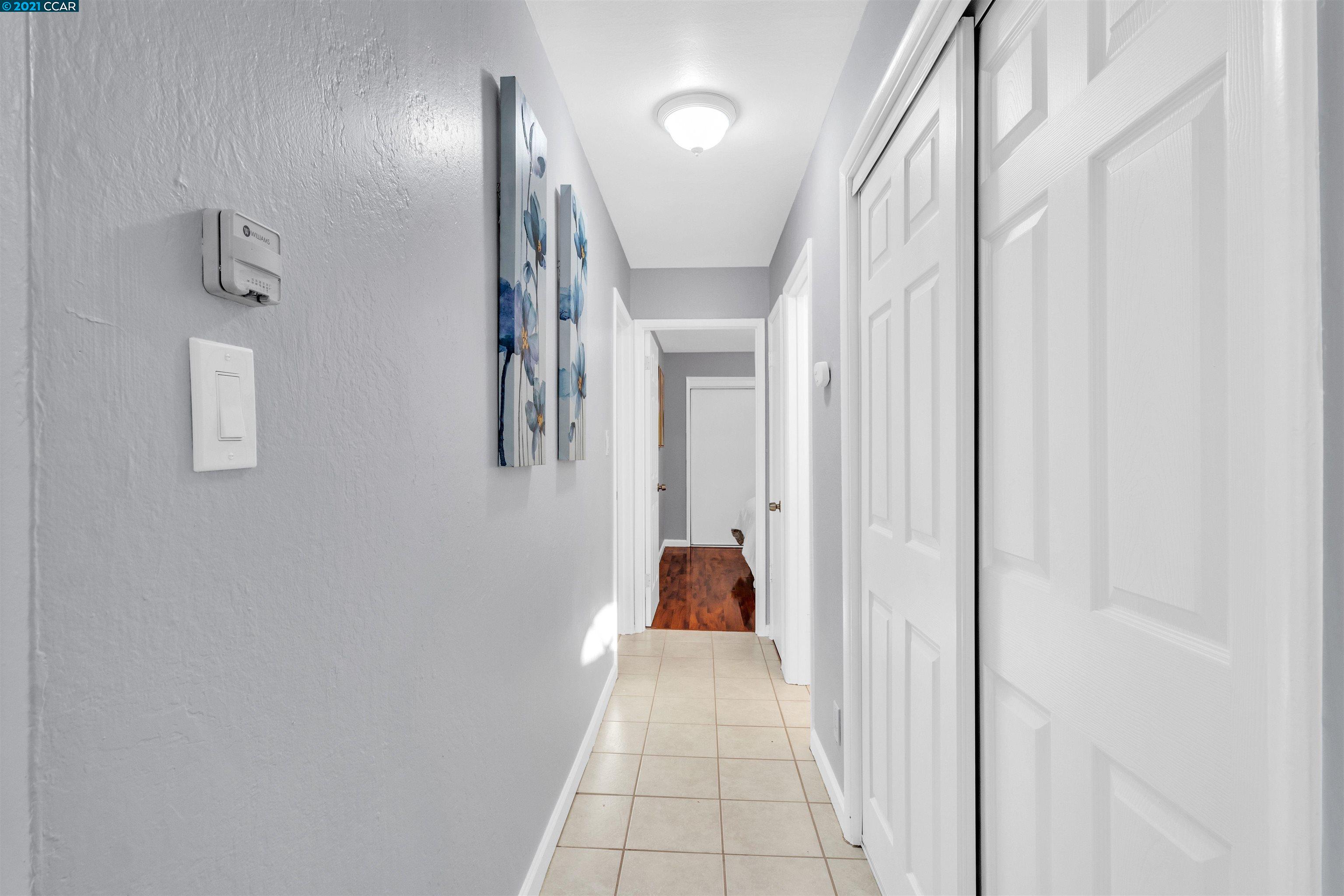 Herbert Guice Way Oakland, CA 94621 - Photo 10 of 40 a view of hallway with stairs