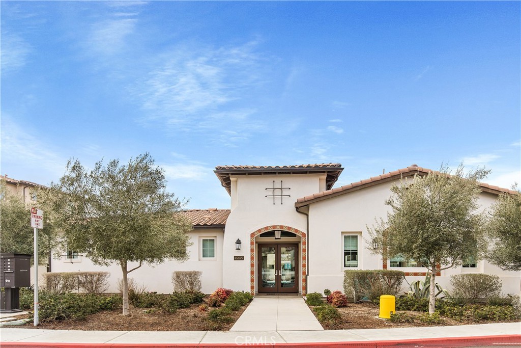 31329 Via Nubes Temecula, CA 92592 - Photo 33 of 45 a front view of a house with a yard