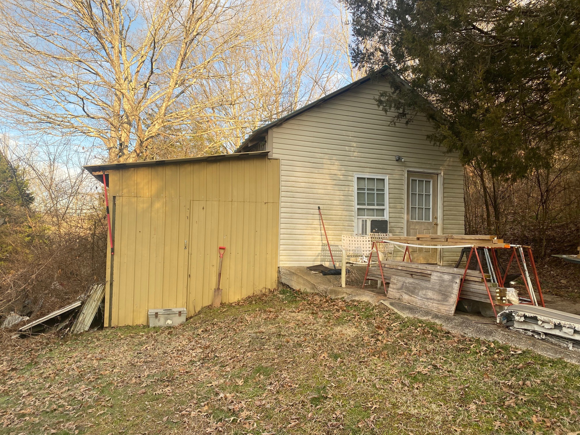 3420 Tarpley Shop Road Pulaski, TN 38478 - Photo 5 of 18 a backyard of a house with table and chairs