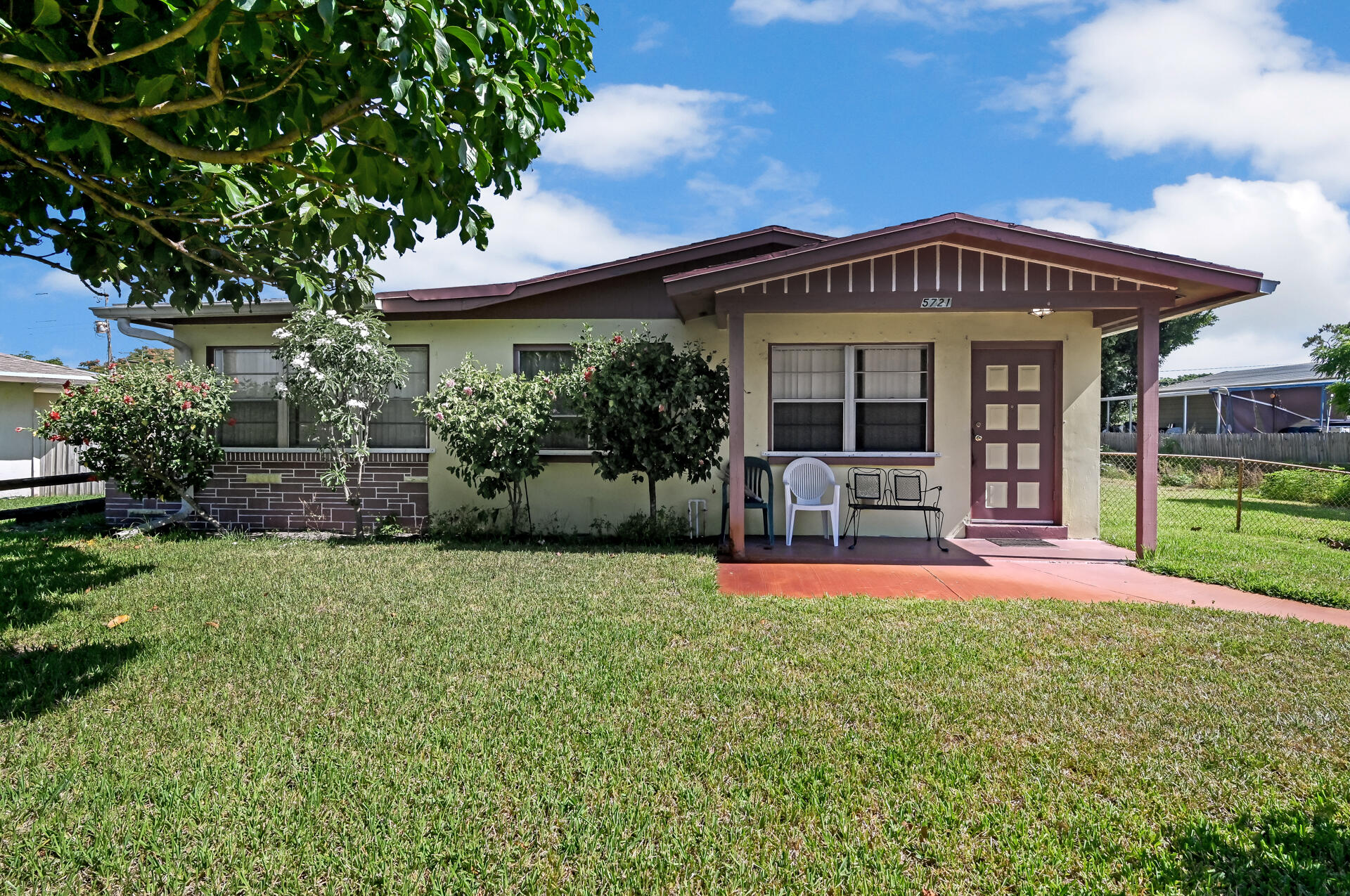 5721 Orange Road Royal Palm Estates, FL 33413 - Photo 1 of 19 01_Front View 01