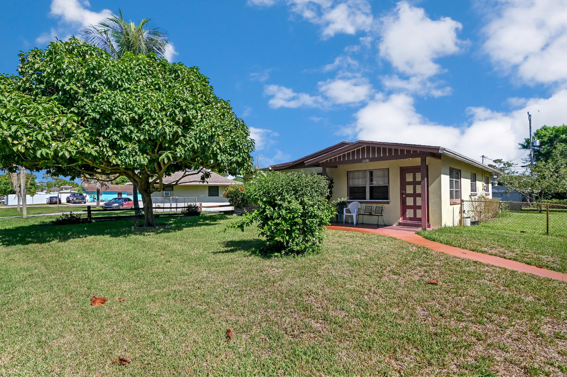 5721 Orange Road Royal Palm Estates, FL 33413 - Photo 3 of 19 03_Front View 03