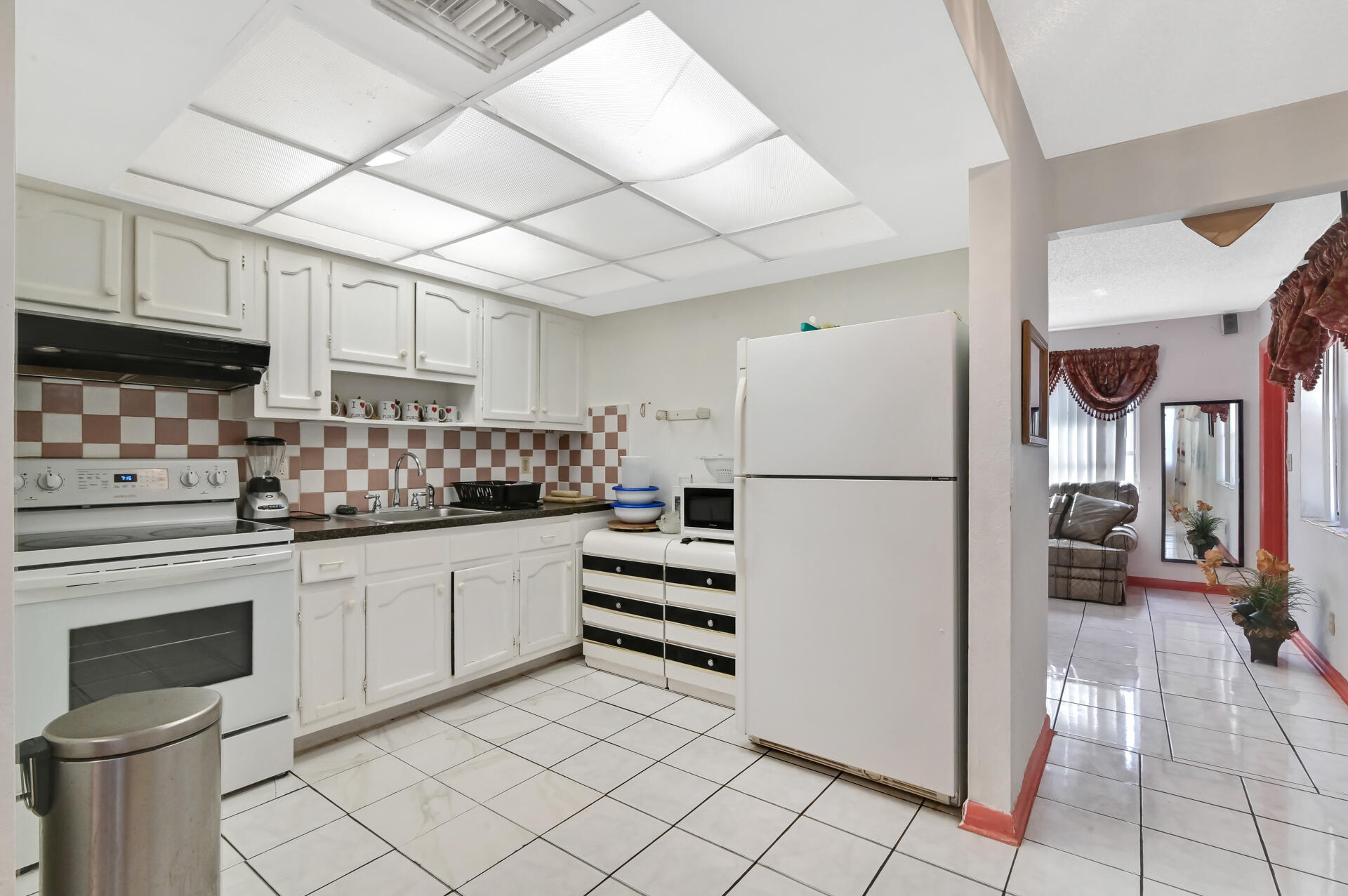 5721 Orange Road Royal Palm Estates, FL 33413 - Photo 7 of 19 07_Kitchen 01