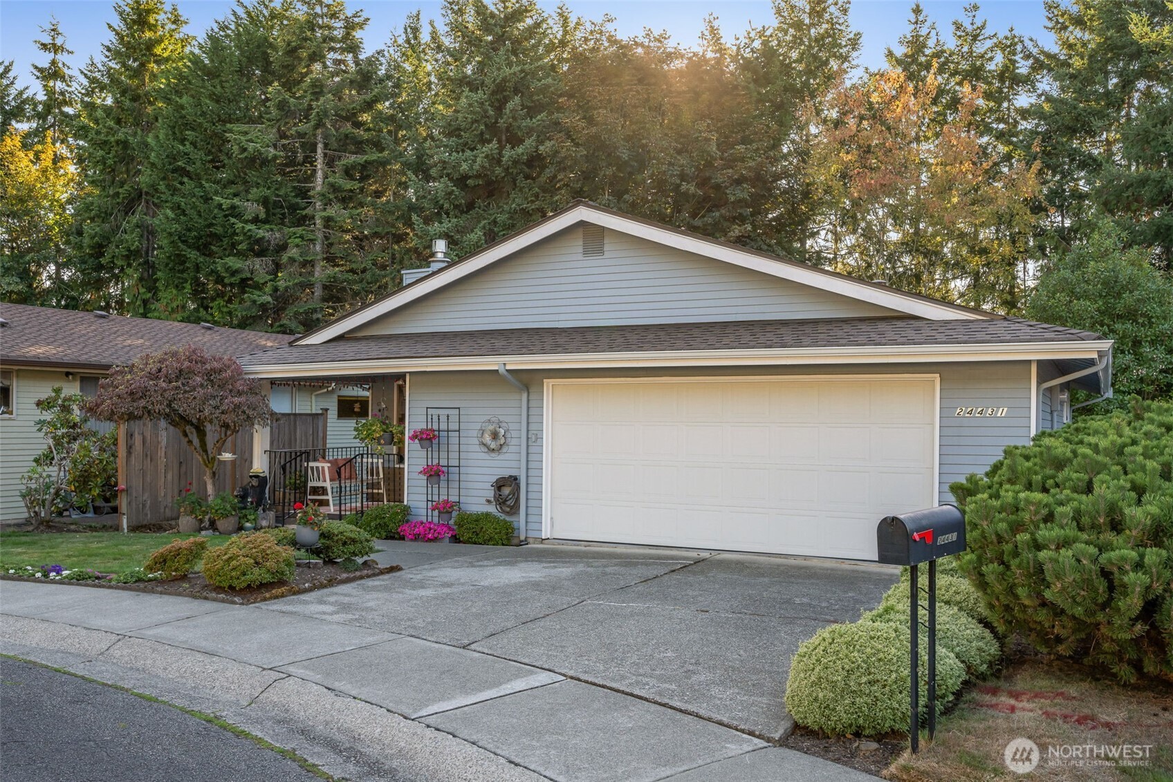 24431 11th Avenue South Des Moines, WA 98198 - Photo 1 of 39 a front view of a house with a garage