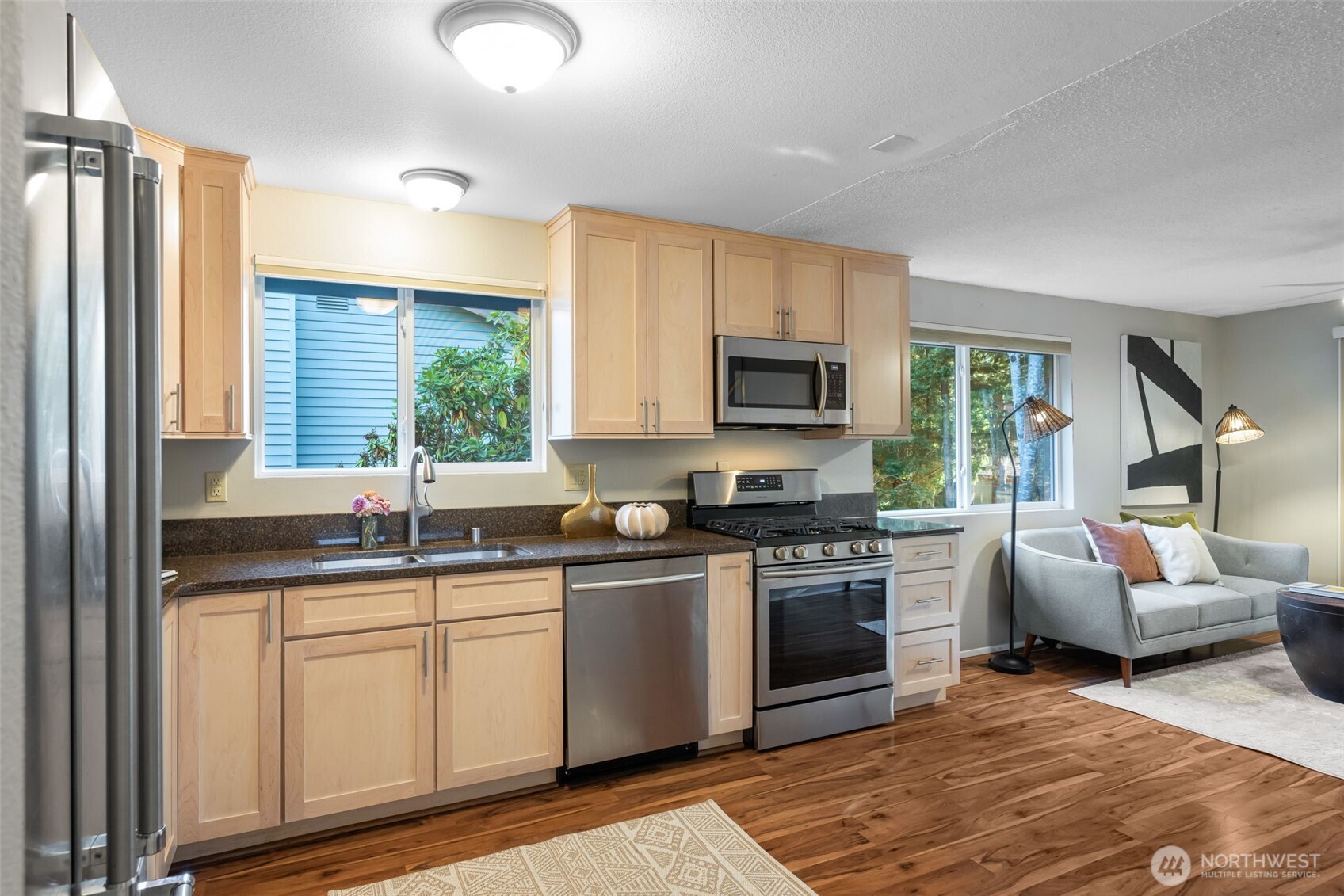 24431 11th Avenue South Des Moines, WA 98198 - Photo 13 of 39 a kitchen with sink cabinets and window