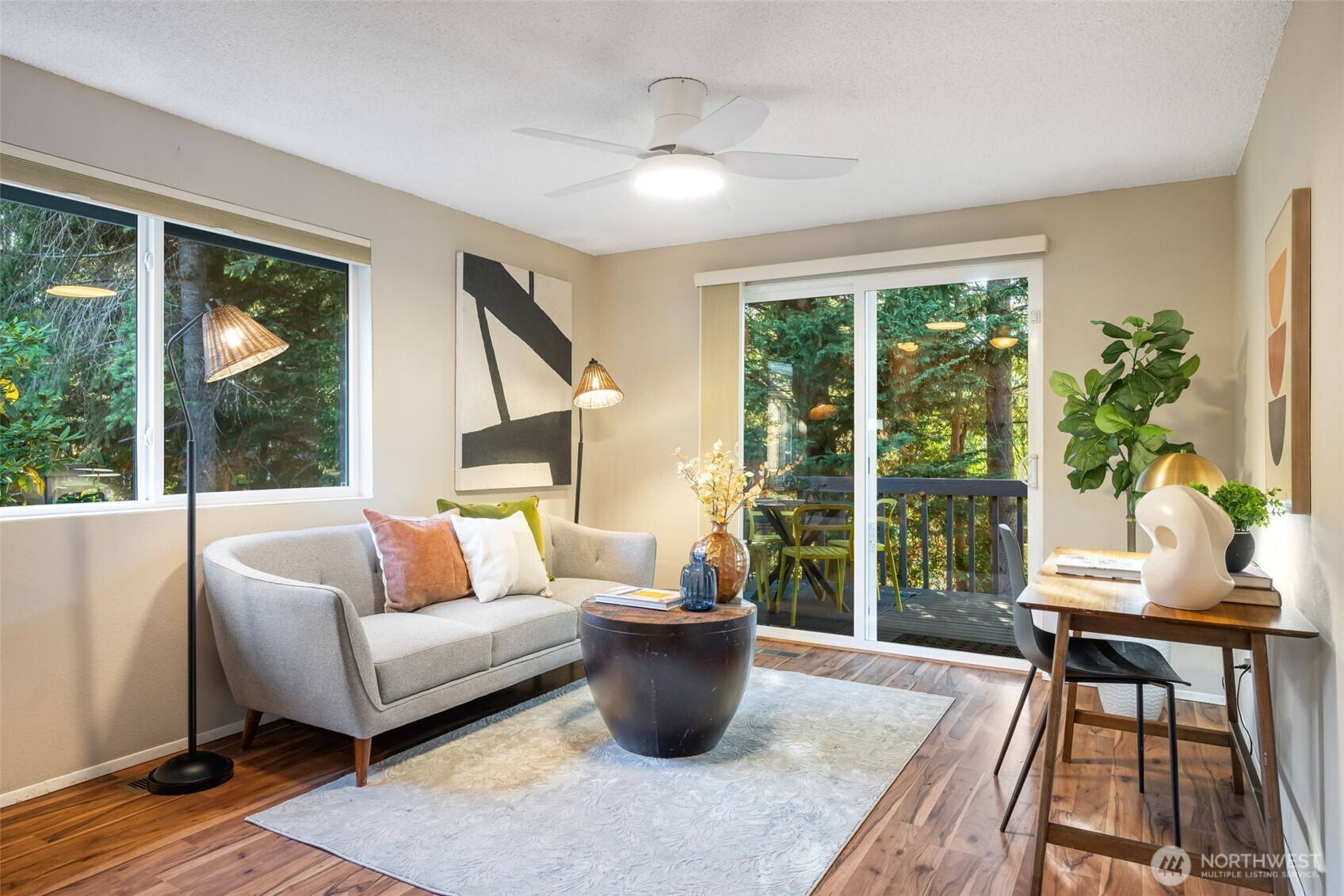 24431 11th Avenue South Des Moines, WA 98198 - Photo 15 of 39 a living room with furniture and a potted plant