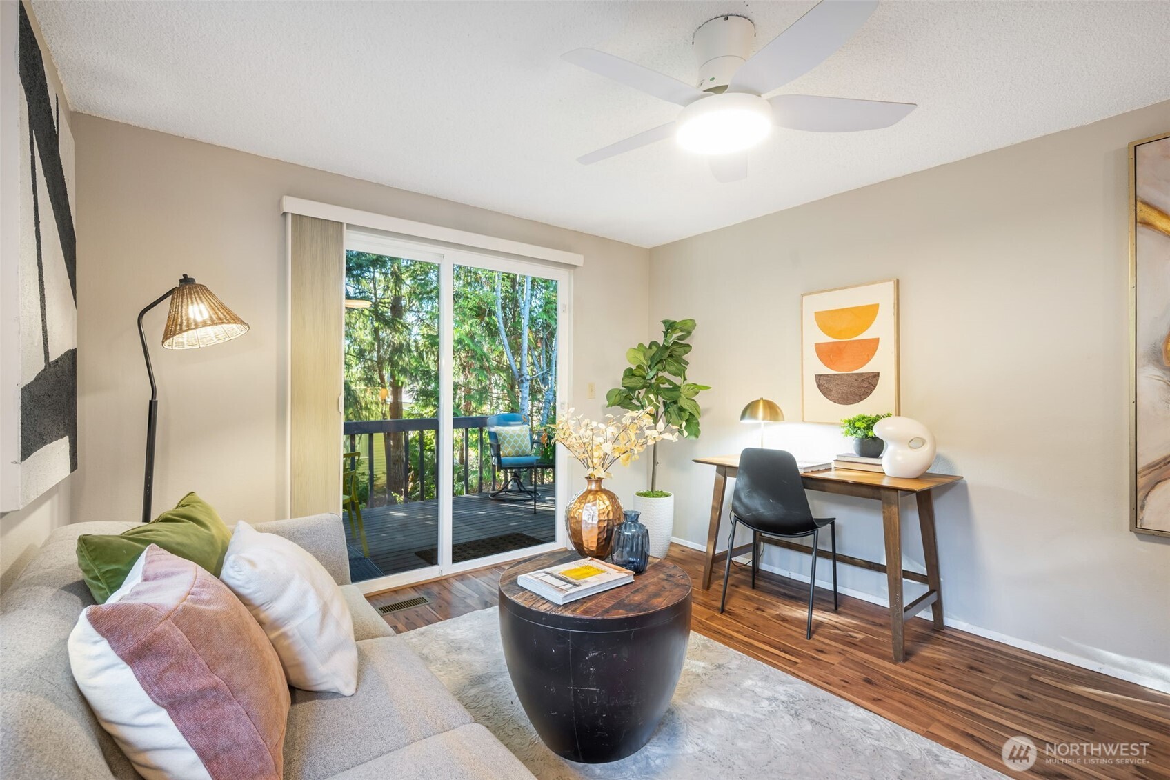24431 11th Avenue South Des Moines, WA 98198 - Photo 16 of 39 a living room with furniture and a potted plant