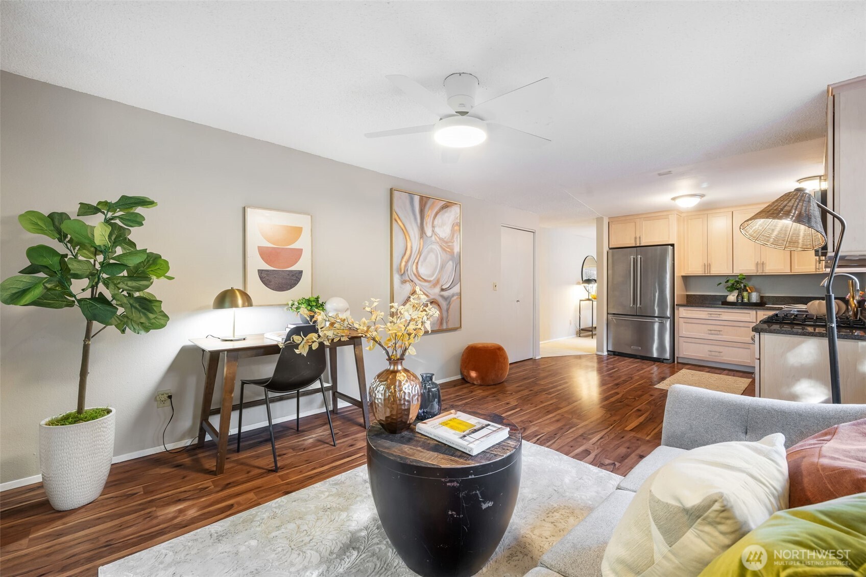 24431 11th Avenue South Des Moines, WA 98198 - Photo 17 of 39 a living room with furniture and a large window