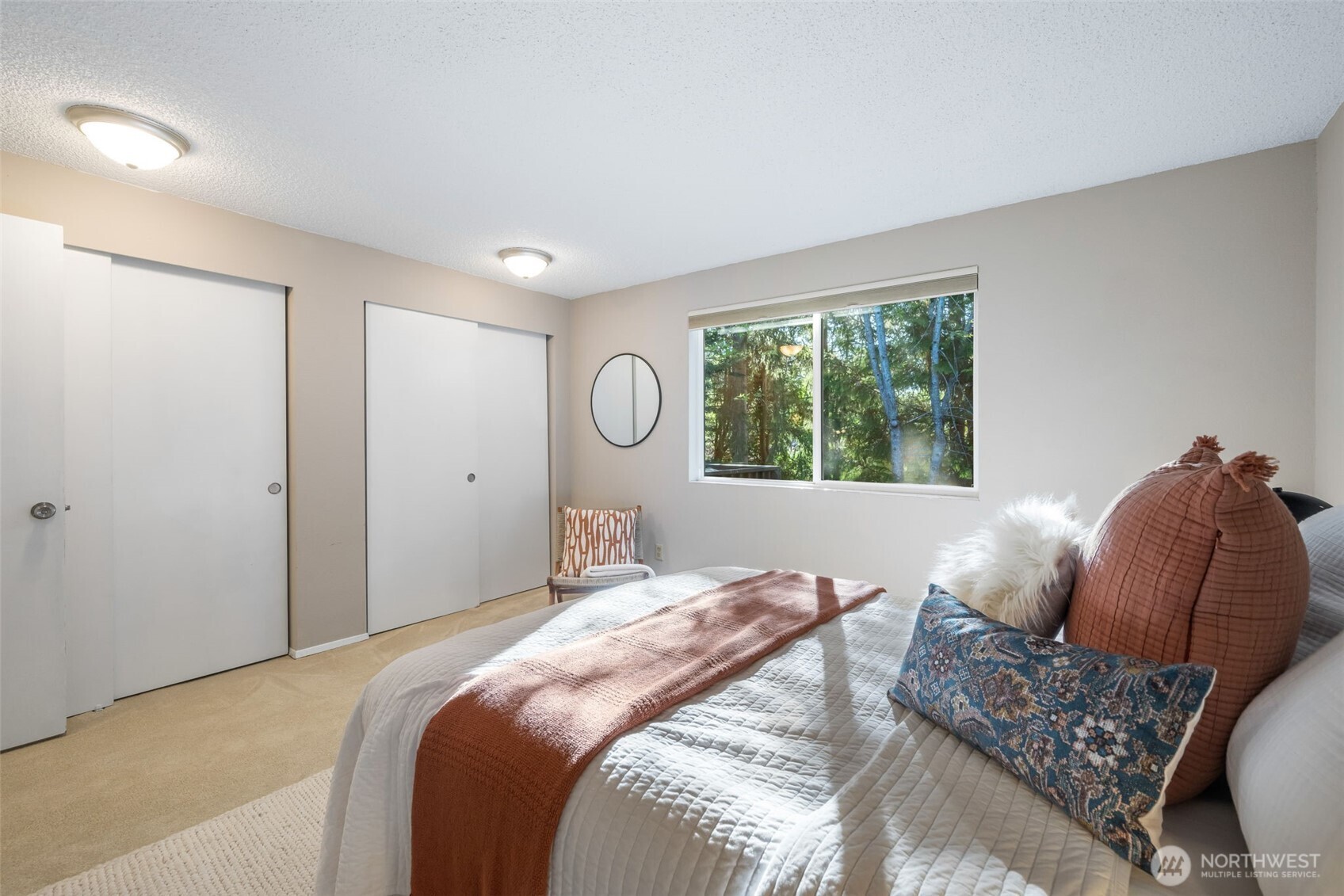 24431 11th Avenue South Des Moines, WA 98198 - Photo 19 of 39 a bedroom with a bed and a window