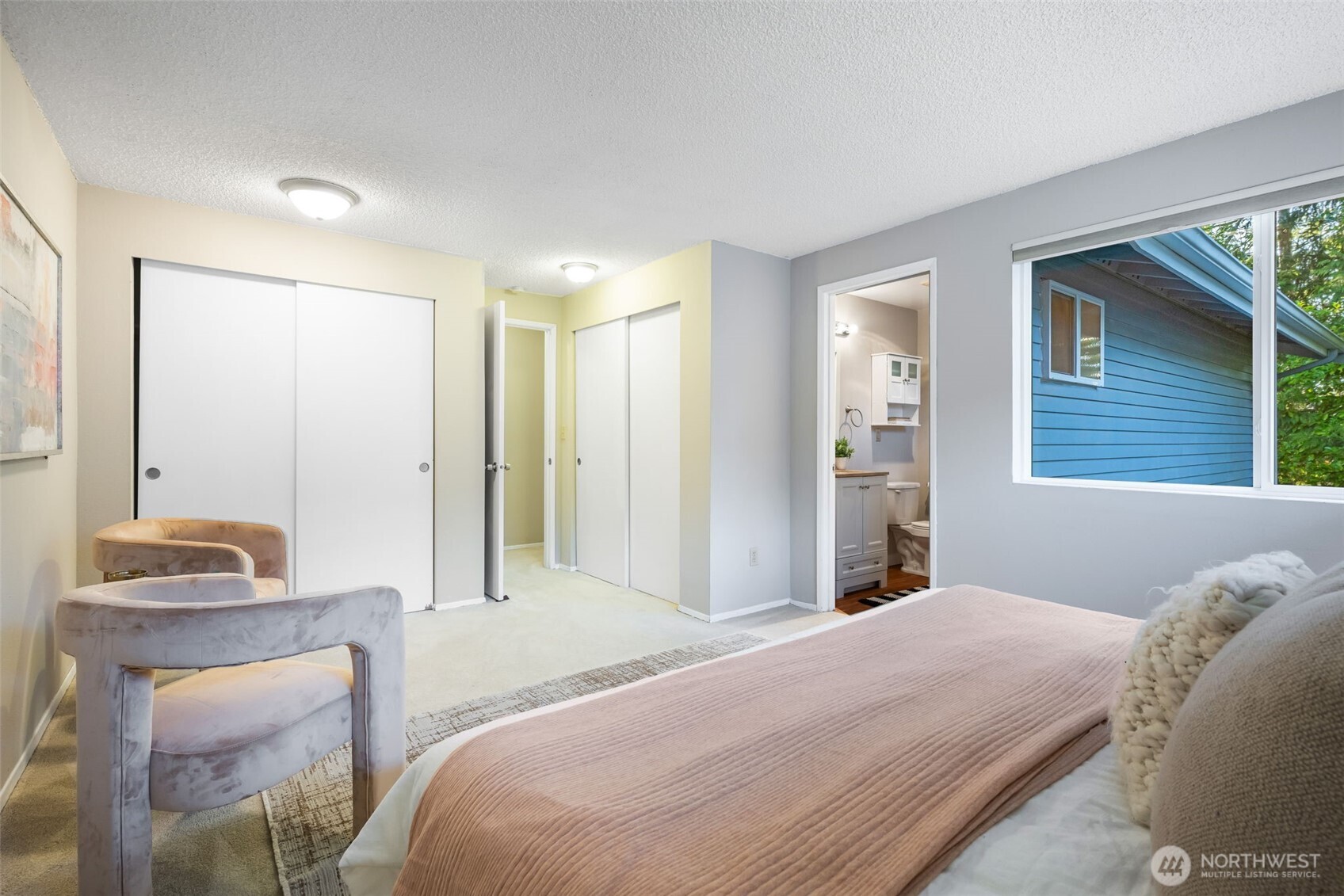 24431 11th Avenue South Des Moines, WA 98198 - Photo 20 of 39 a bedroom with a bed and a dresser