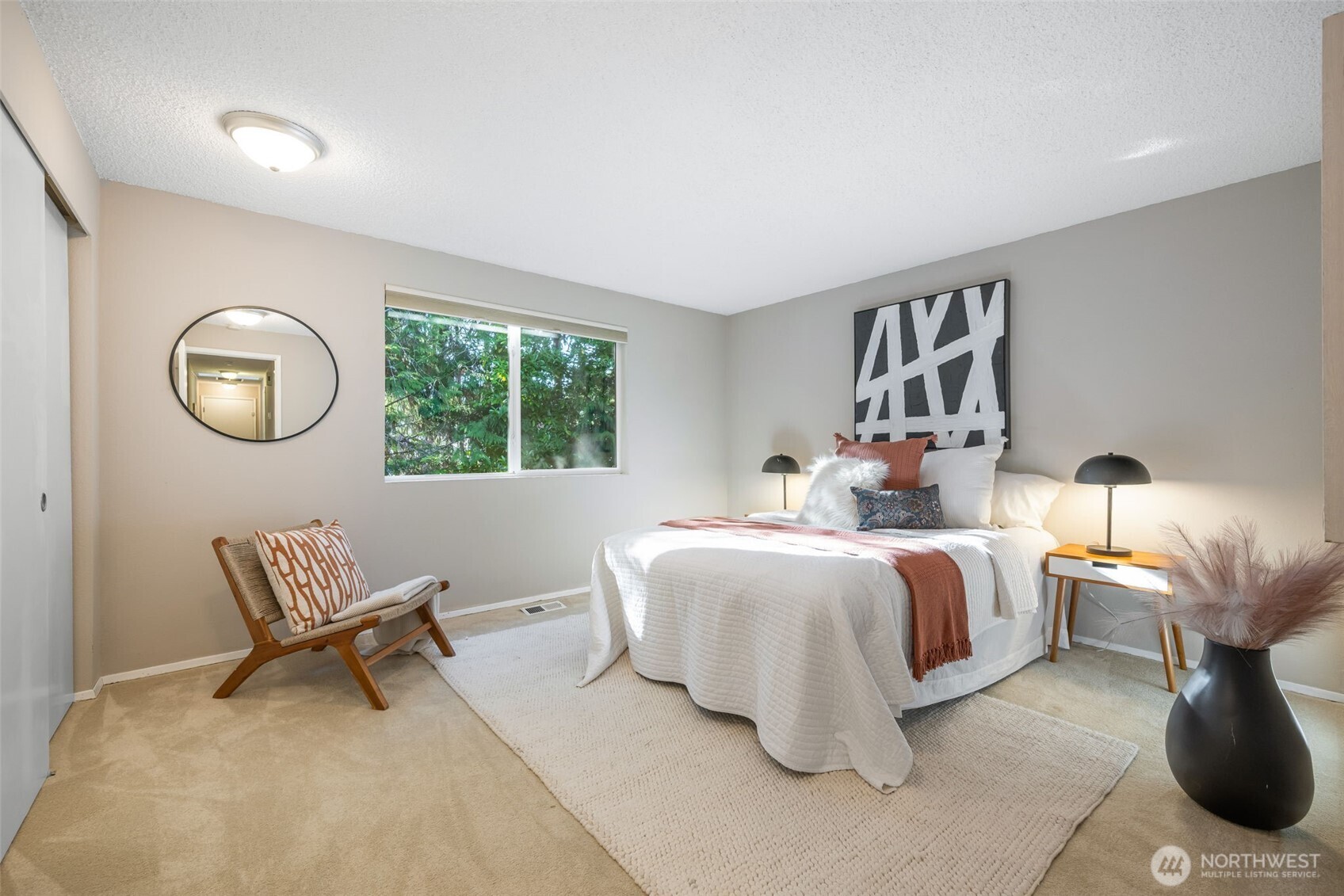 24431 11th Avenue South Des Moines, WA 98198 - Photo 22 of 39 a bed room with bed and a window