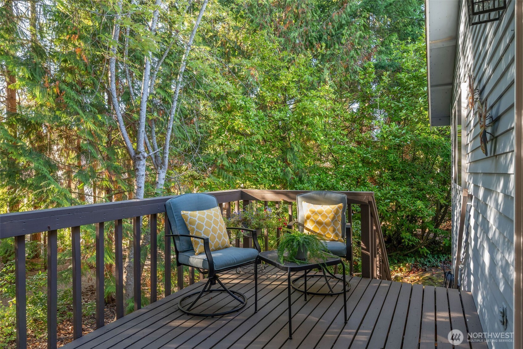 24431 11th Avenue South Des Moines, WA 98198 - Photo 27 of 39 a view of balcony with wooden floor and outdoor seating