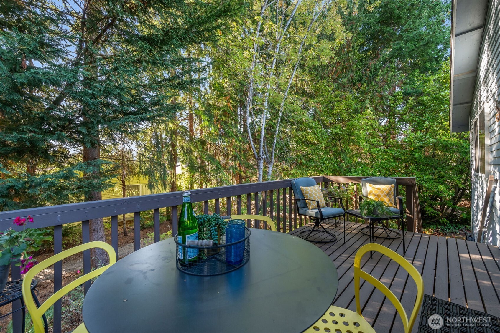 24431 11th Avenue South Des Moines, WA 98198 - Photo 28 of 39 a view of a balcony with chairs and wooden floor
