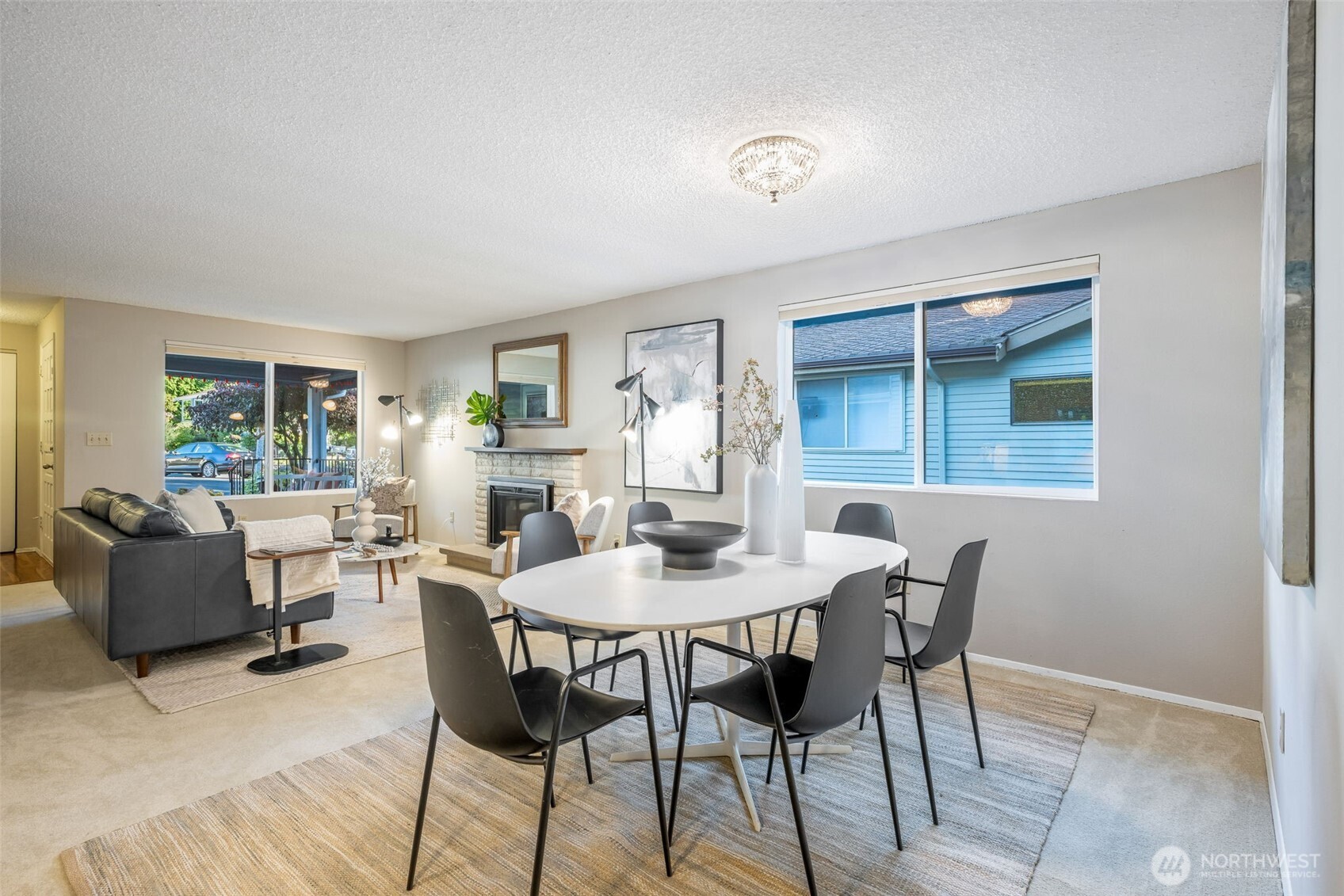 24431 11th Avenue South Des Moines, WA 98198 - Photo 8 of 39 a view of a dining room with furniture and wooden floor
