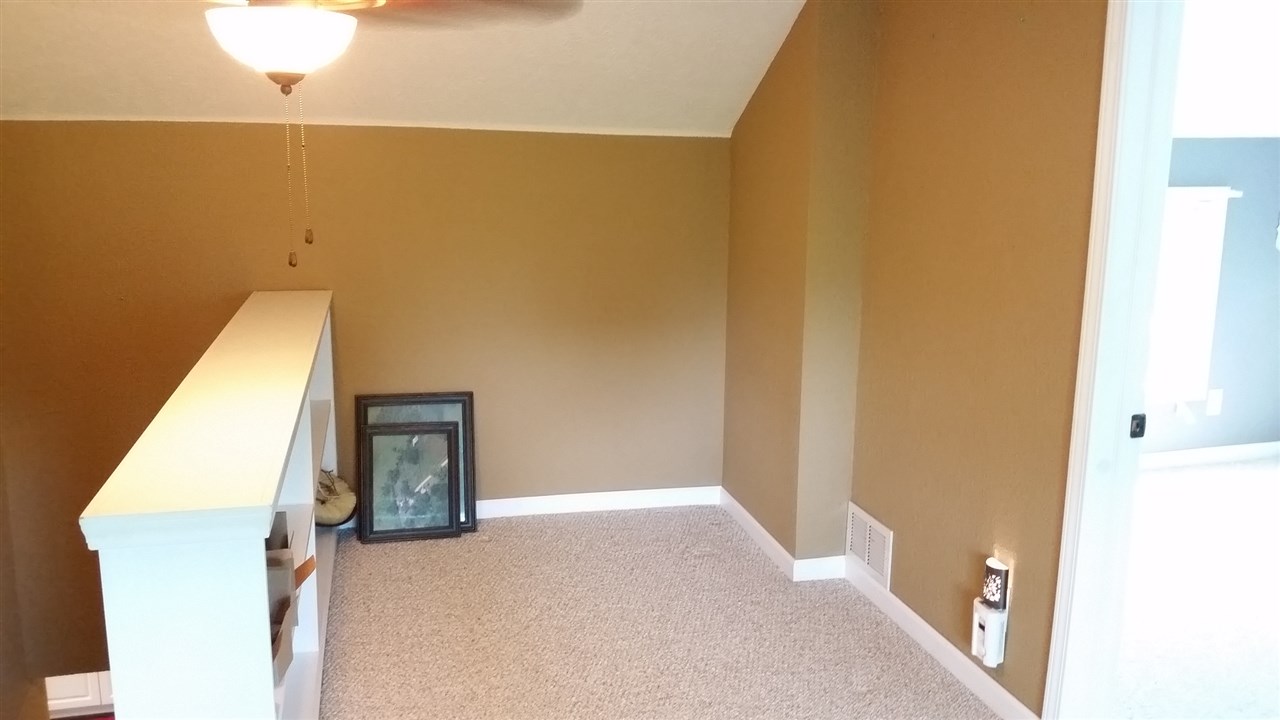 16844 Wheeler Road Durand, IL 61024 - Photo 11 of 22 a view of a livingroom with wooden floor
