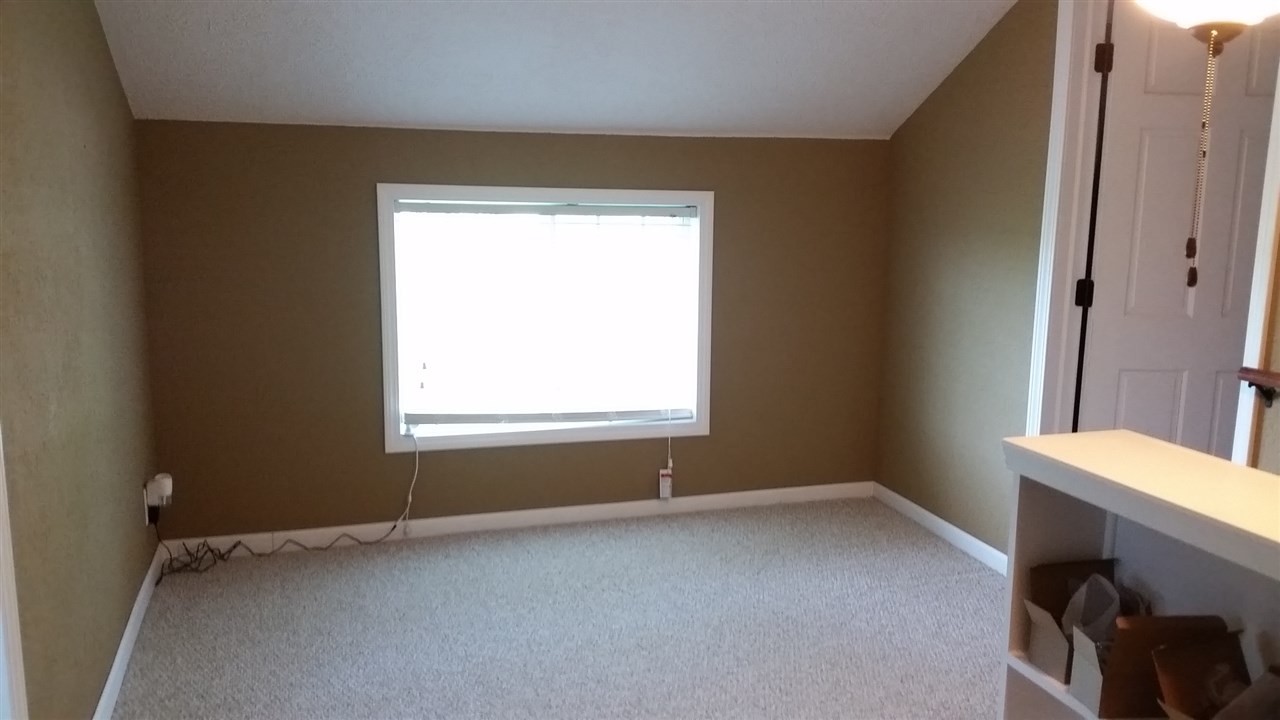 16844 Wheeler Road Durand, IL 61024 - Photo 12 of 22 a view of an empty room with a window