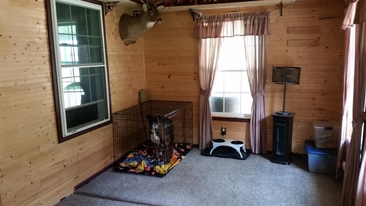 16844 Wheeler Road Durand, IL 61024 - Photo 6 of 22 a bedroom with a bed and a window
